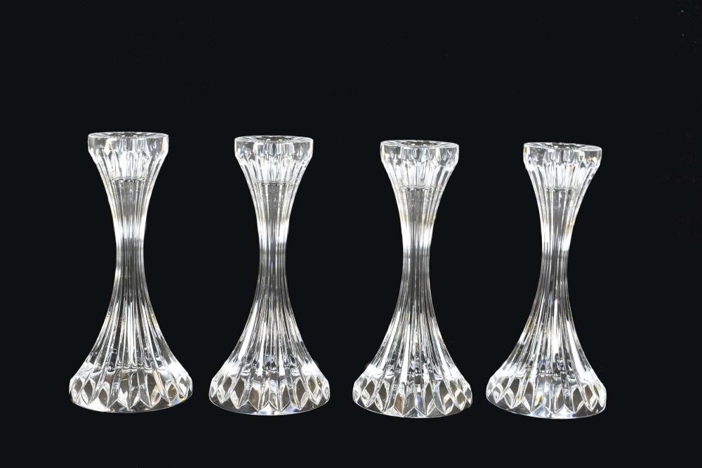 Appraisal: SET OF FOUR BACCARAT COLORLESS GLASS CANDLESTICKSSigned Flared with vertical