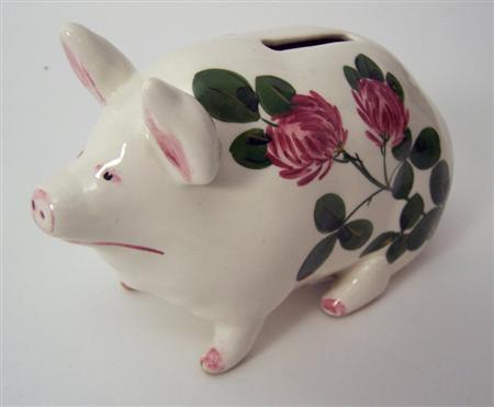 Appraisal: PLICHTA PIG MONEYBOX FIGURE POST decorated with clover printed marks