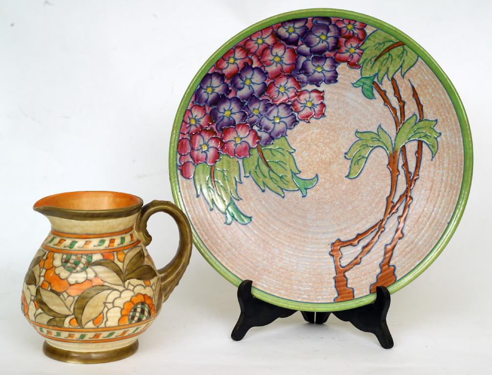 Appraisal: CHARLOTTE RHEAD FOR CROWN DUCAL HYDRANGEA PATTERN CHARGER tubelined and