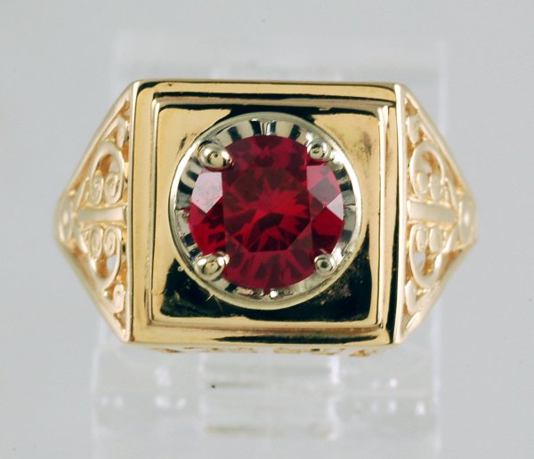 Appraisal: Ladies ruby ring Yellow gold reticulated setting marked K White