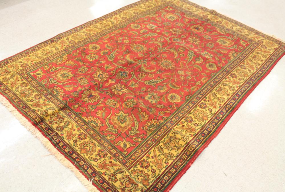 Appraisal: HAND KNOTTED PERSIAN CARPET overall floral Tabriz design on red