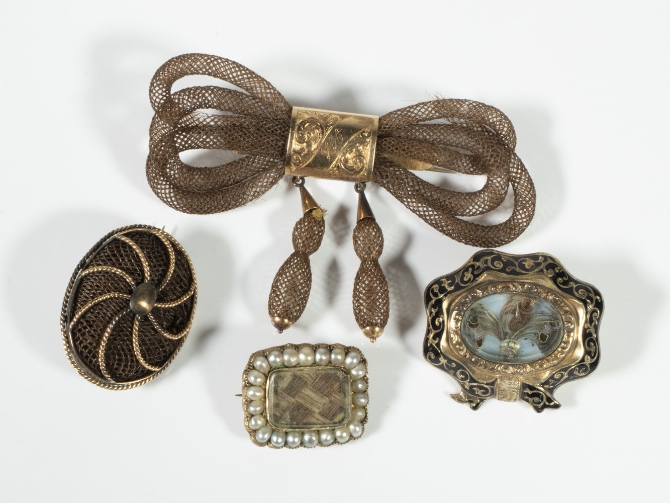 Appraisal: VICTORIAN HAIR BROOCHES Lot of Assorted Woven Hair Brooches circa