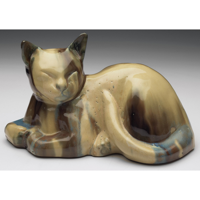 Appraisal: Fulper sculpture reclining cat covered in a tan brown and