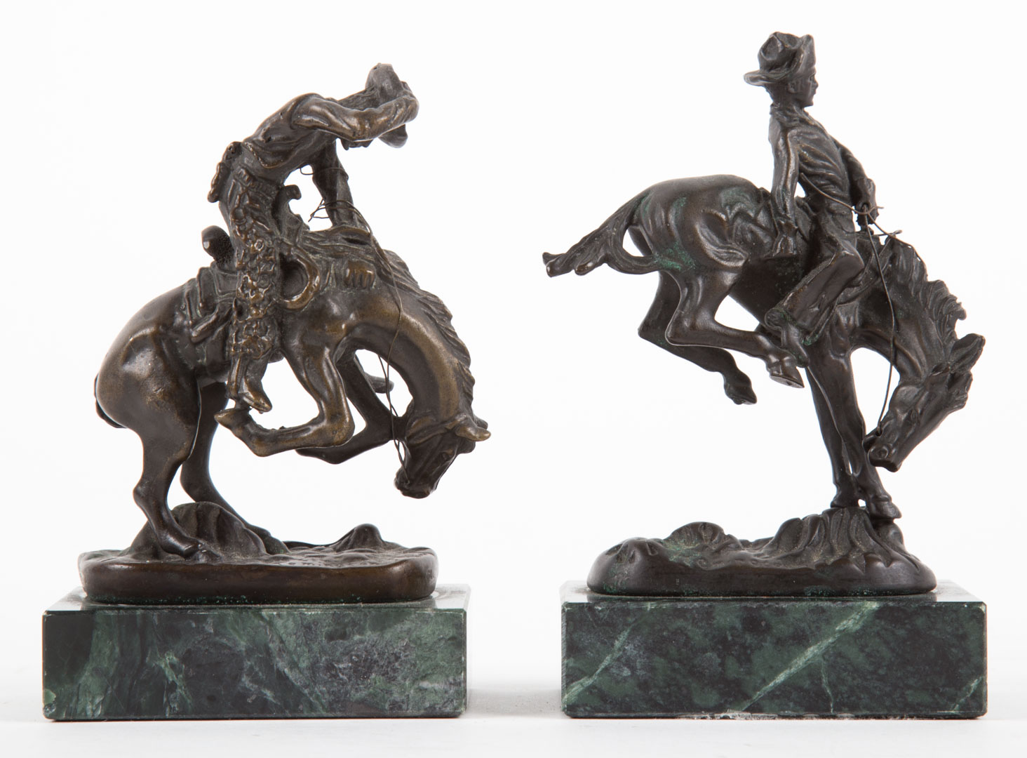 Appraisal: Two miniature bronzes after Remington Outlaw and Rattlesnake mounted on