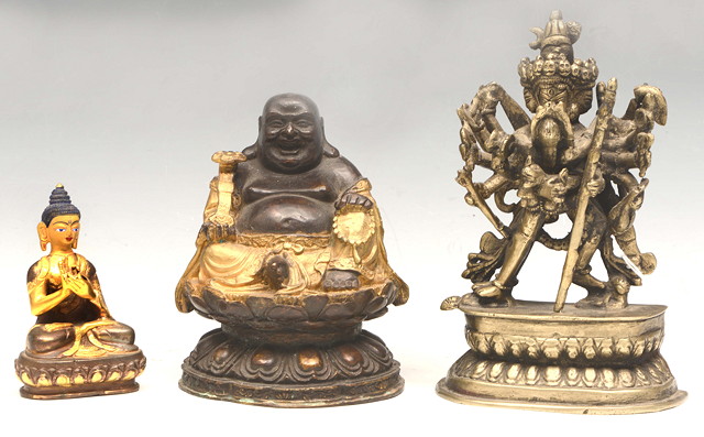 Appraisal: A SMALL GILT BRONZE FIGURE OF CHAKRASAMVARA sitting upon a