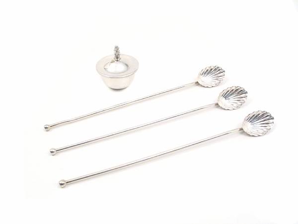 Appraisal: A sterling set of eleven straw spoons and a Saccharine