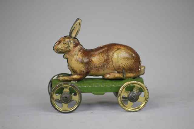 Appraisal: RABBIT ON WHEELS PENNY TOY Fischer ears move as toy