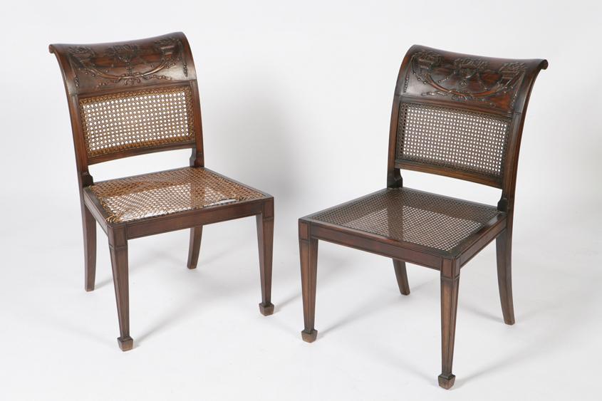 Appraisal: A PAIR OF NEO-CLASSICAL STYLE MAHOGANY SALON CHAIRS with swept