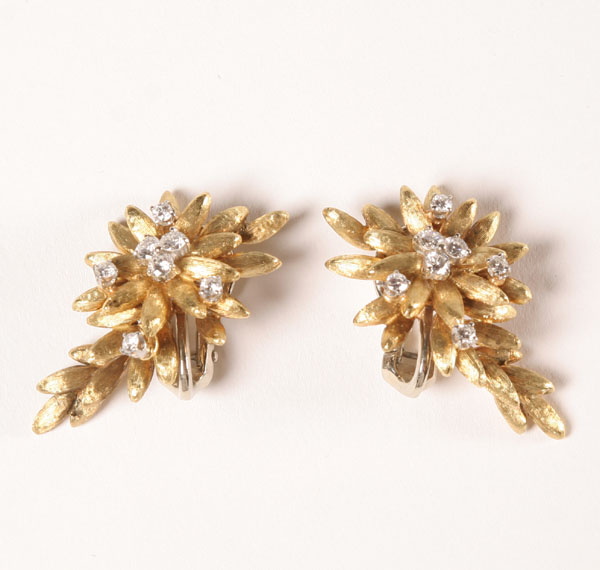 Appraisal: Gold K floriform dangle earrings set with full cut diamonds