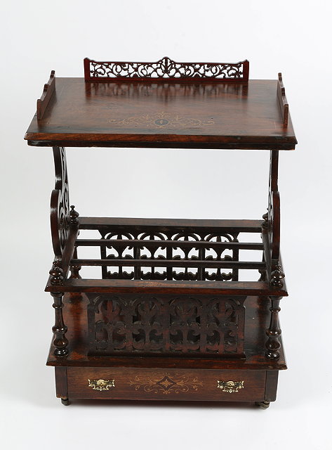 Appraisal: A VICTORIAN ROSEWOOD CANTERBURY with satinwood inlay pierced scrolling decoration