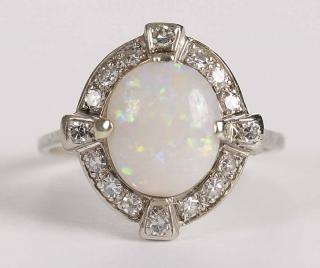 Appraisal: kt Diamond Opal Ring center oval cabochon opal approx x