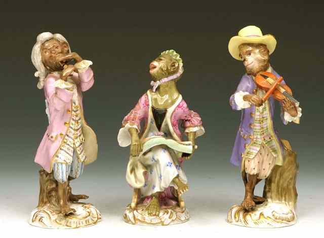 Appraisal: A MEISSEN PORCELAIN MONKEY TRIO CONSISTING OF a singer and