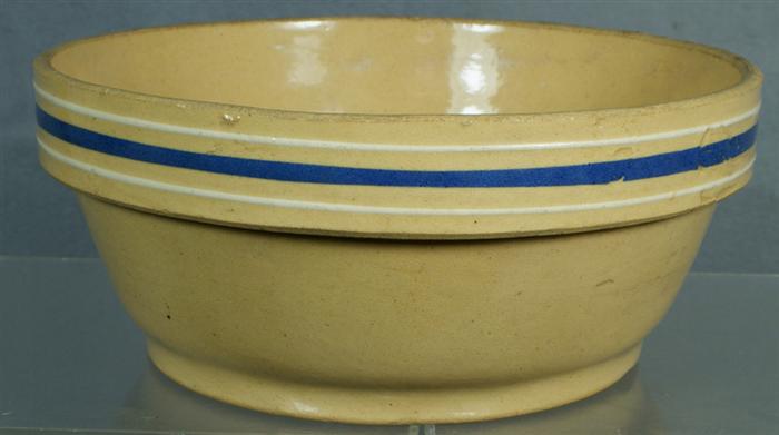 Appraisal: Yellowware bowl light blue cream slip bands impressed BAK-EZEE WATTWARE