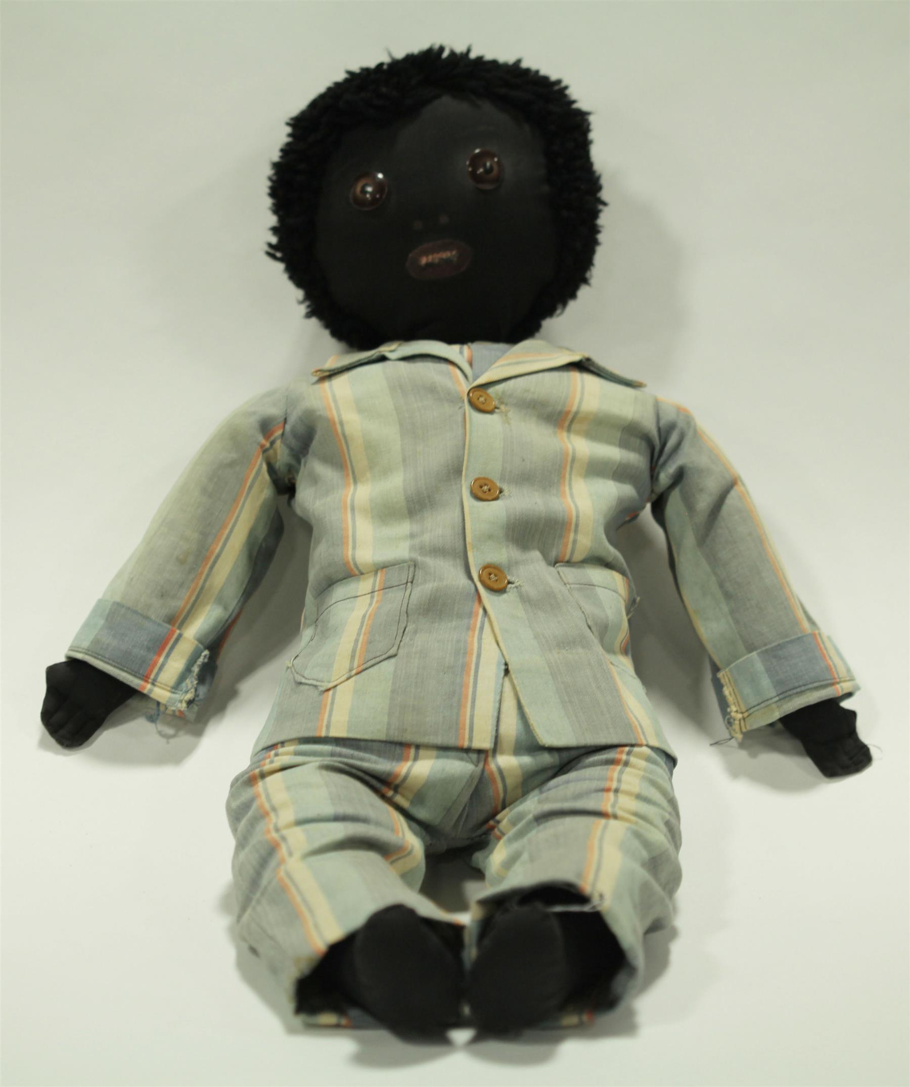 Appraisal: LARGE BLACK CLOTH DOLL Early s doll with button eyes