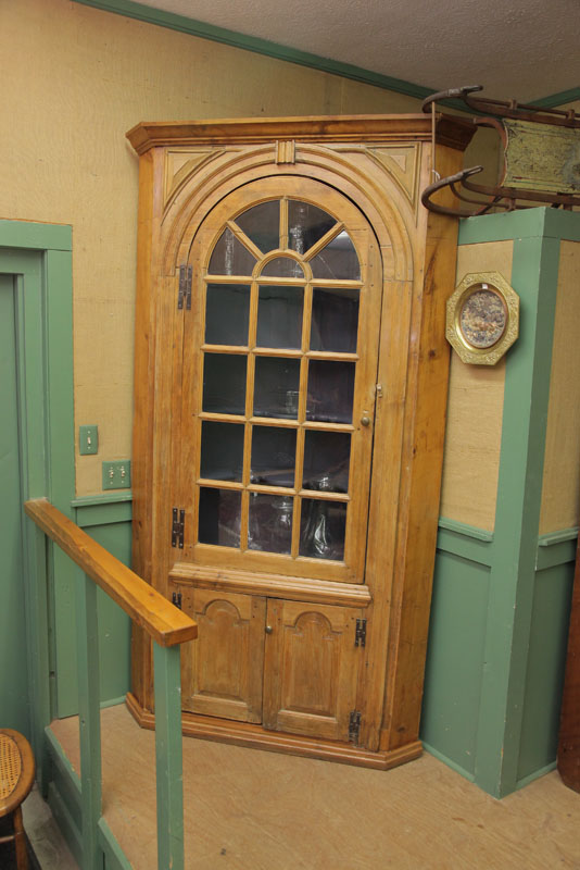 Appraisal: ARCHITECTUAL CORNER CUPBOARD Pine having a molded cornice arched and