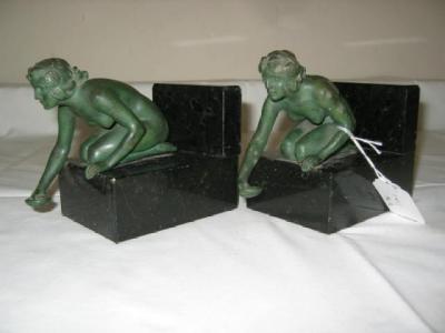 Appraisal: A PAIR OF ART DECO BOOK ENDS each comprising a