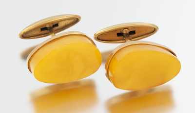 Appraisal: A Pair of Butterscotch Color Bakelite Cufflinks k yellow gold