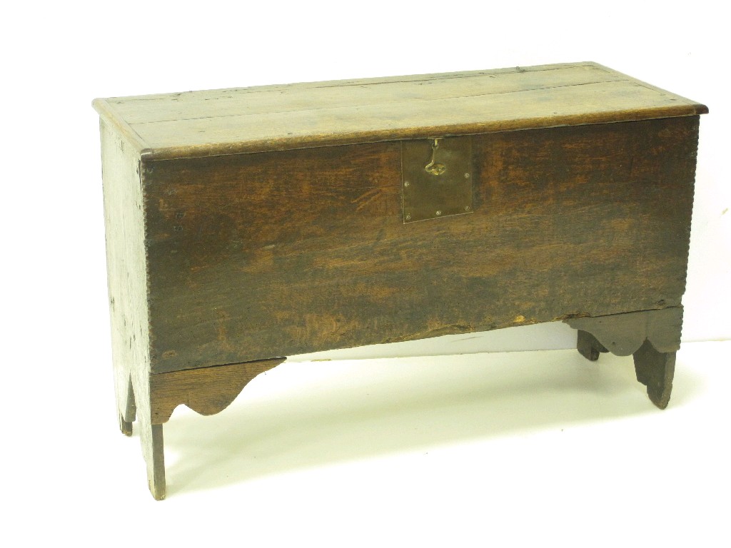 Appraisal: An th Century boarded oak Chest with plain hinged lid