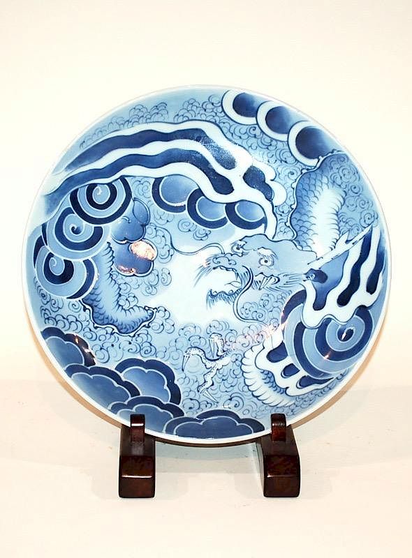 Appraisal: A Japanese Blue and Glaze Dragon Platter in d From