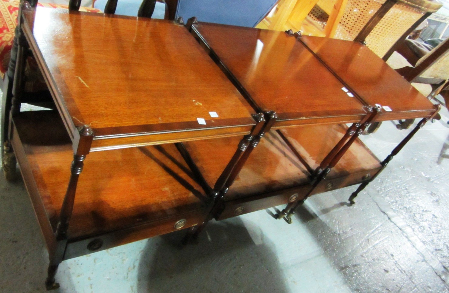 Appraisal: A group of three th century mahogany two tier night