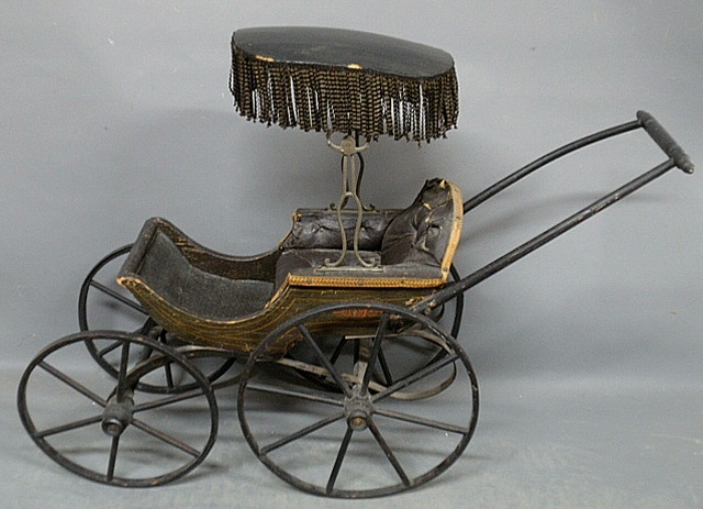 Appraisal: - Victorian doll buggy with original leather seat paint and