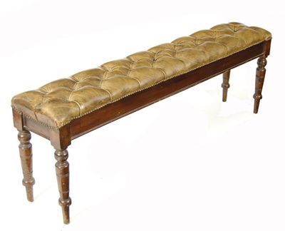 Appraisal: A late Victorian rectangular long stool with button upholstered leather