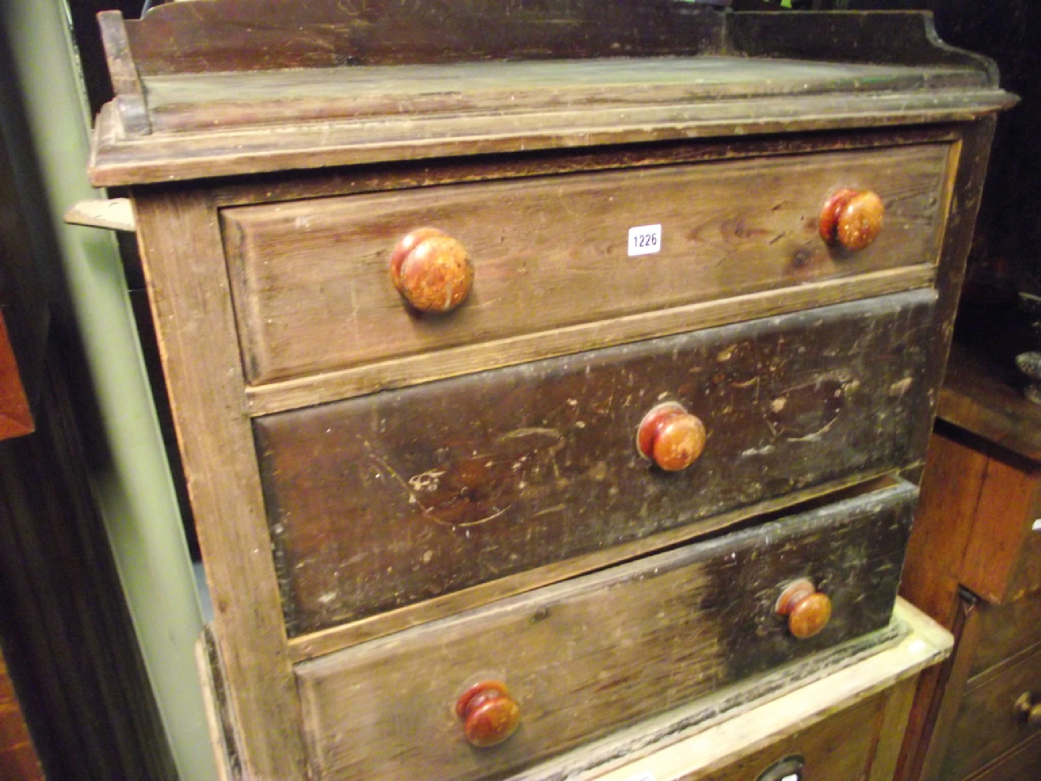 Appraisal: A Victorian stained pine three drawer bedroom chest washstand with