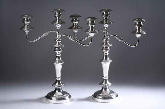 Appraisal: PAIR SHEFFIELD PLATE THREE-LIGHT CONVERTIBLE CANDELABRA mid- th century Circular