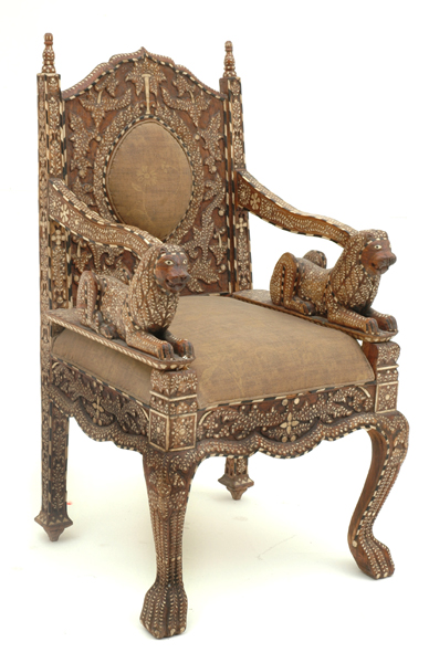 Appraisal: A PAIR OF INDIAN TEAK EBONY AND BONE INLAID ARMCHAIRS