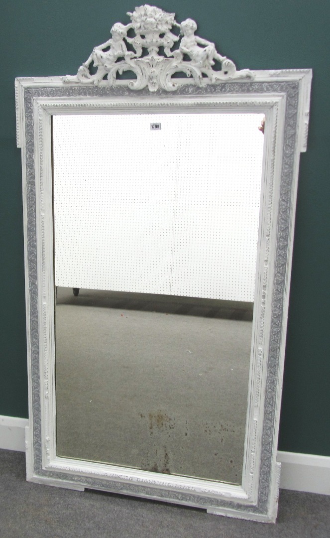 Appraisal: A th century white and grey painted wall mirror the