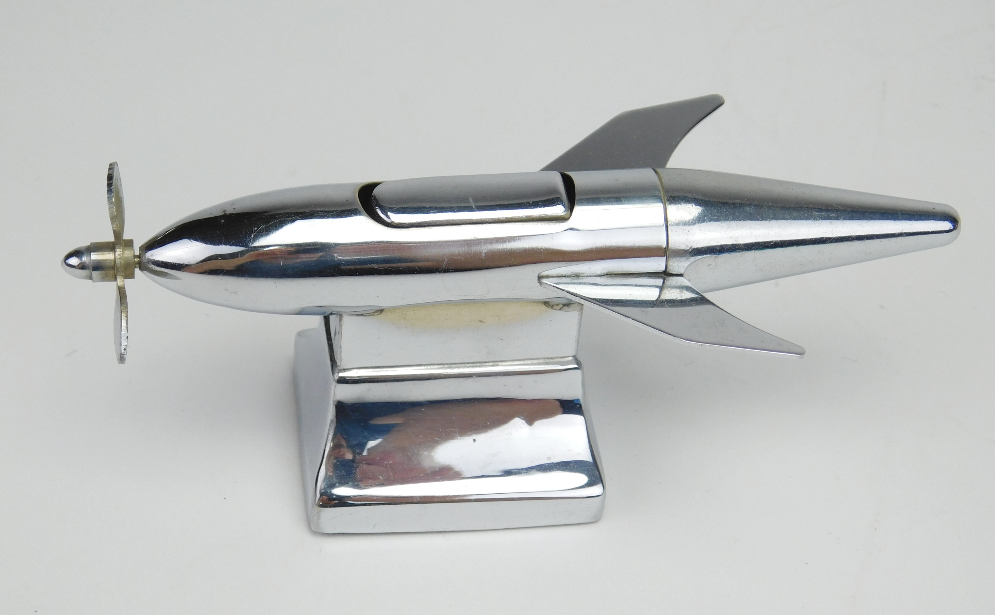 Appraisal: Vintage Occupied Japan chrome rocket ship lighter ca - on