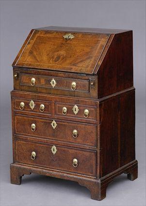 Appraisal: QUEEN ANNE WALNUT DIMINUTIVE TWO-PART BUREAU BOOKCASE The cross-banded and