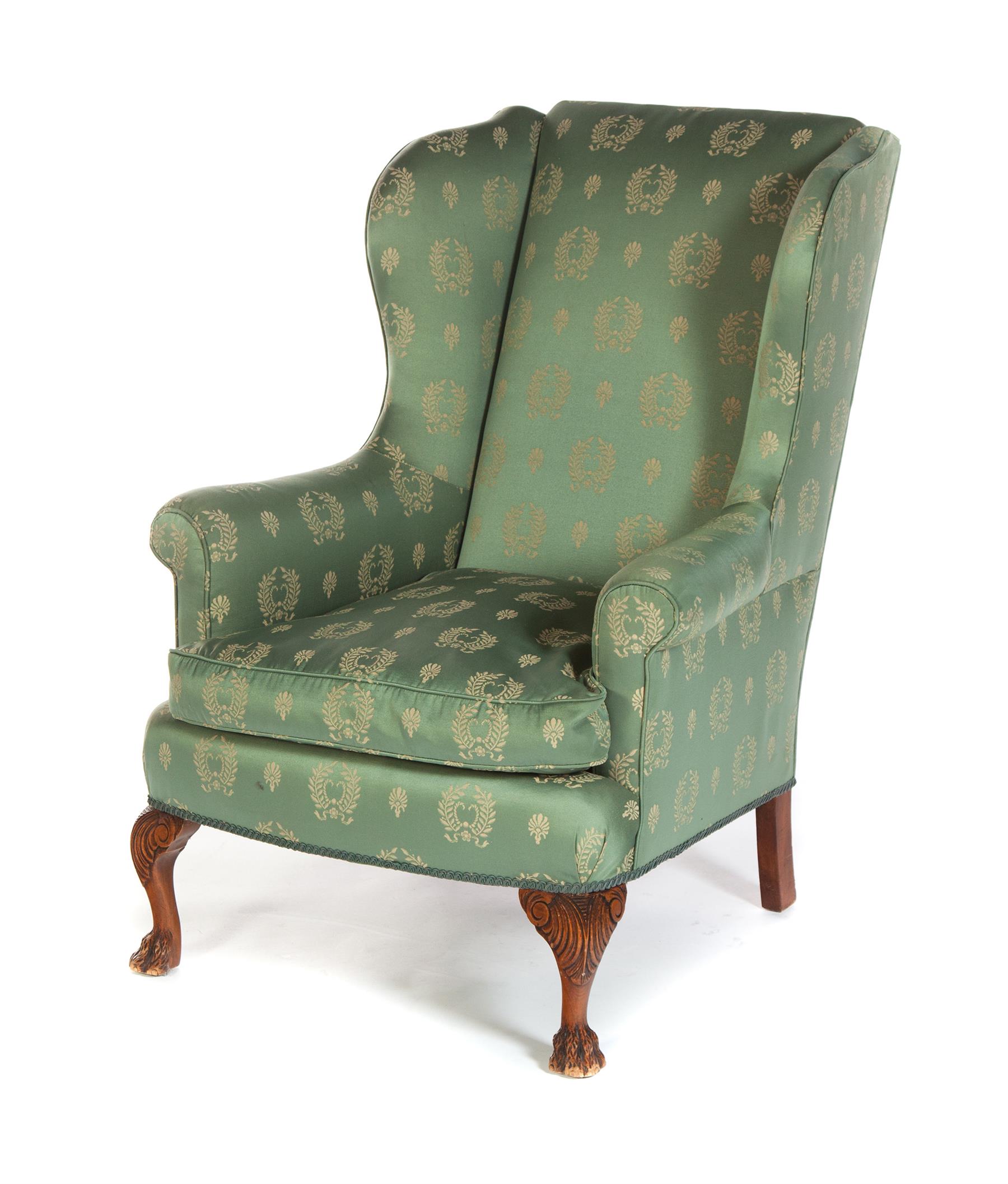 Appraisal: CHIPPENDALE-STYLE WING-BACK ARMCHAIR American th century Green upholstery with cream-gold