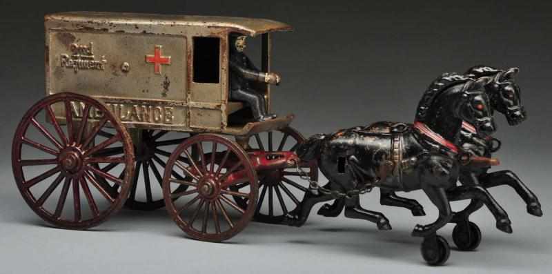 Appraisal: Cast Iron Harris Ambulance Horse-Drawn Toy Description American Marked nd