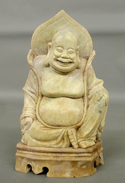 Appraisal: - Carved soapstone seated smiling Buddha probably late th c