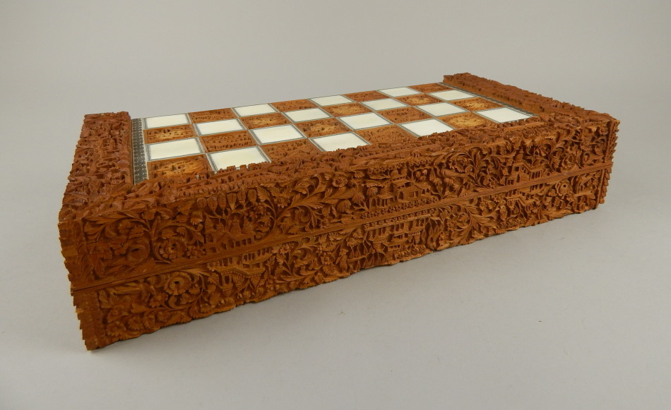 Appraisal: A heavily carved sandalwood and bone inlaid Indian games box