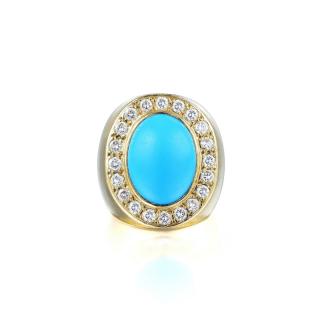 Appraisal: A Turquoise and Diamond Ring Featuring a centered oval-shaped cabochon