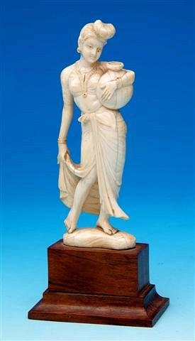 Appraisal: A th Century Indian ivory figure of a woman holding