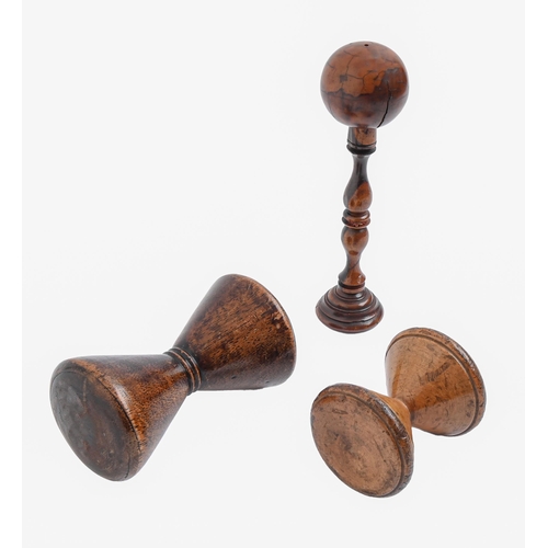 Appraisal: A Victorian turned lignum vitae cup and ball toy and