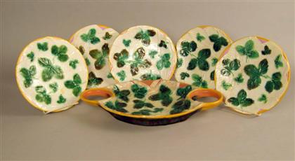 Appraisal: George Jones majolica part strawberry serving set circa Comprising a