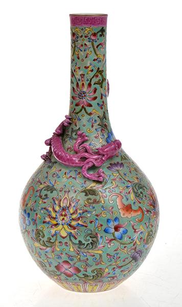 Appraisal: ELABORATE AND HEAVILY ENAMELLED CHINESE TURQUOISE GROUND FAMILLE ROSE BOTTLE