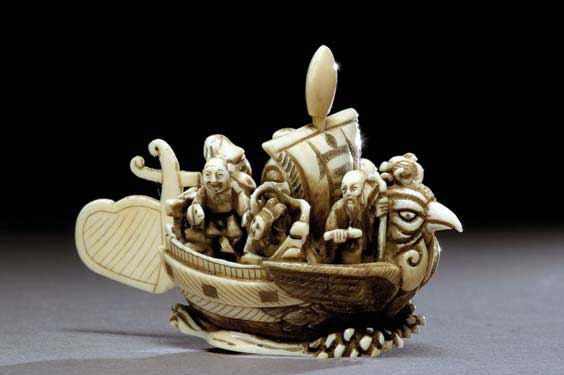 Appraisal: CARVED IVORY NETSUKE Well carved okimono-size contemporary ivory netsuke of