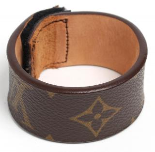 Appraisal: Louis Vuitton Monogram Canvas Cuff Bracelet With suede lining Velcro