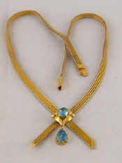 Appraisal: A carat gold blue zircon necklace centre stone approx x