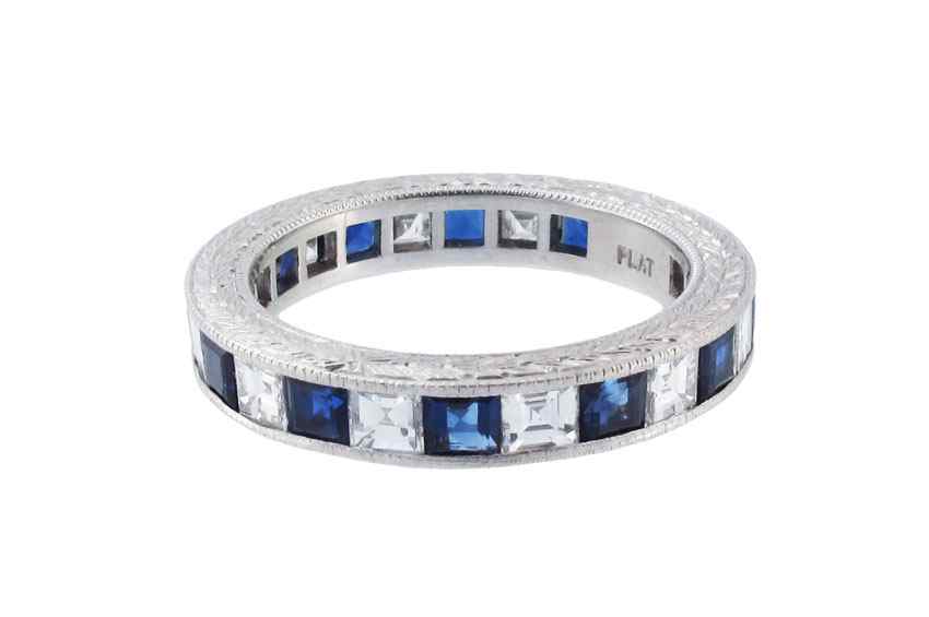 Appraisal: 's SAPPHIRE AND DIAMOND ETERNITY BAND Platinum band contains square