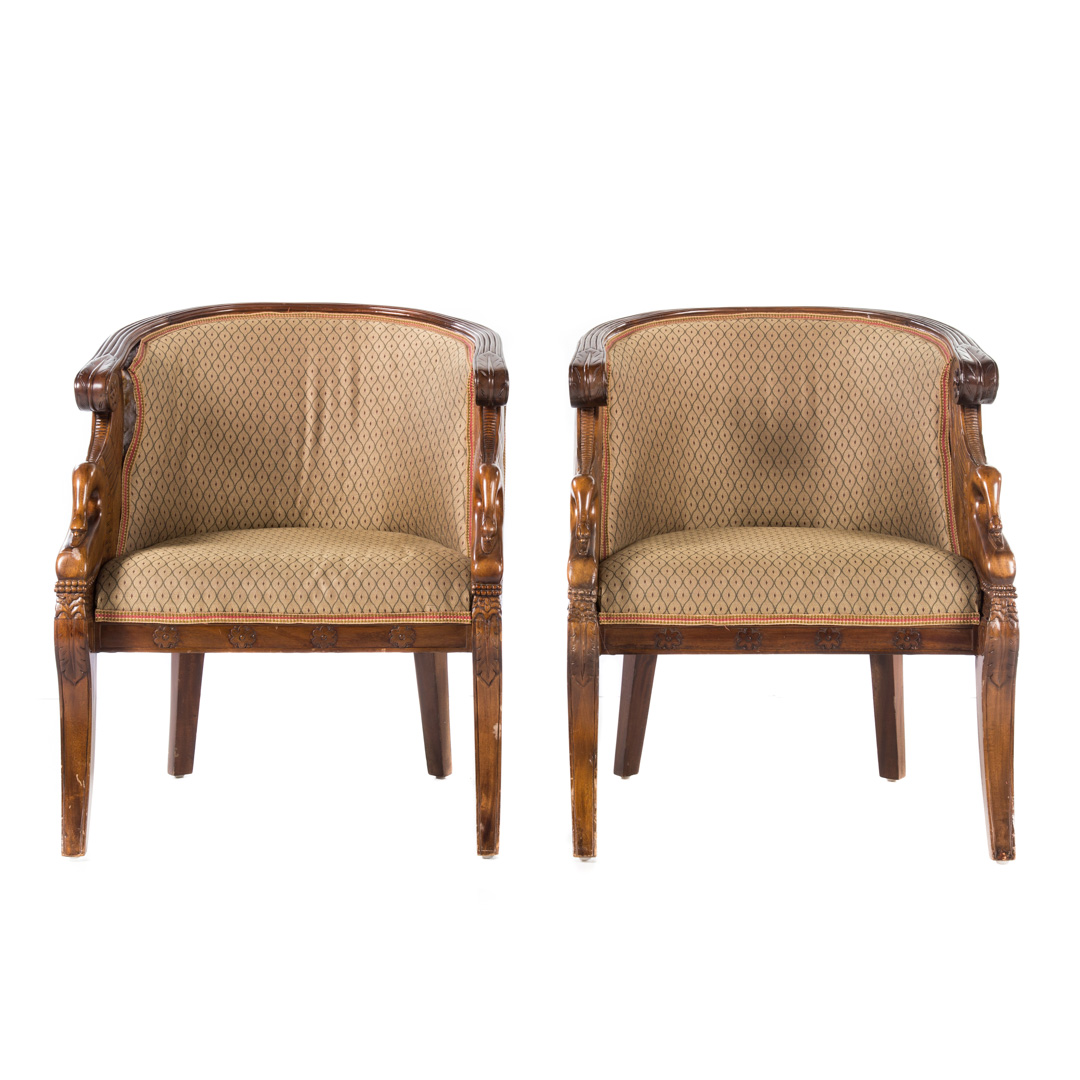 Appraisal: Pair Empire style carved upholstered bergeres th century reeded barrel