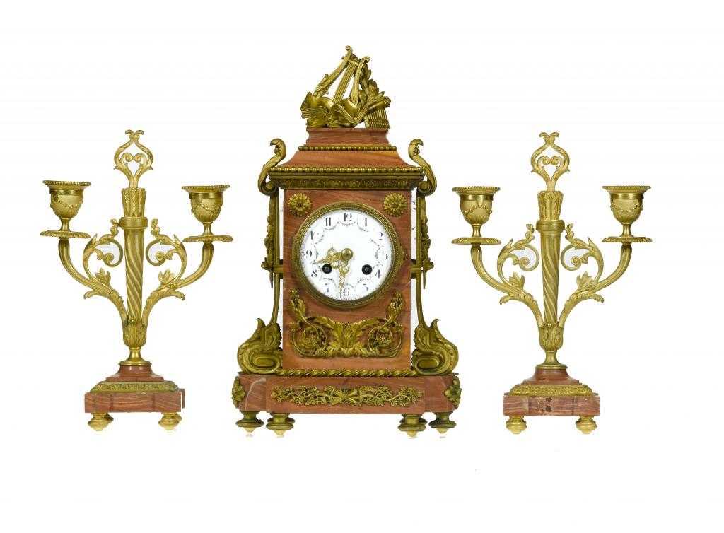 Appraisal: A FRENCH GILT BRONZE AND PINK MARBLE CLOCK GARNITURE in