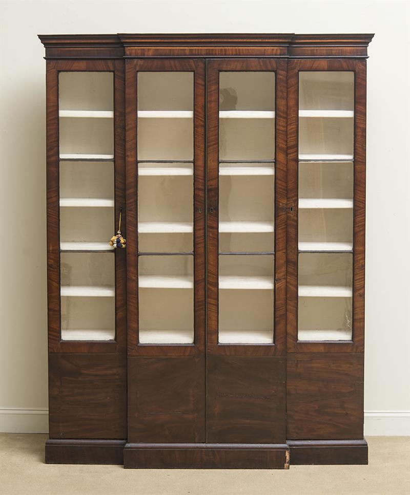 Appraisal: GEORGE III MAHOGANY BOOKCASE Now fitted for electricity x x