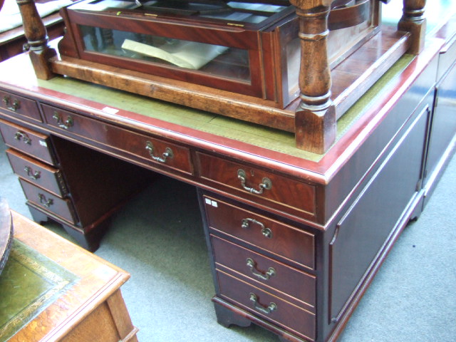 Appraisal: A George III style mahogany pedestal desk the gilt tooled