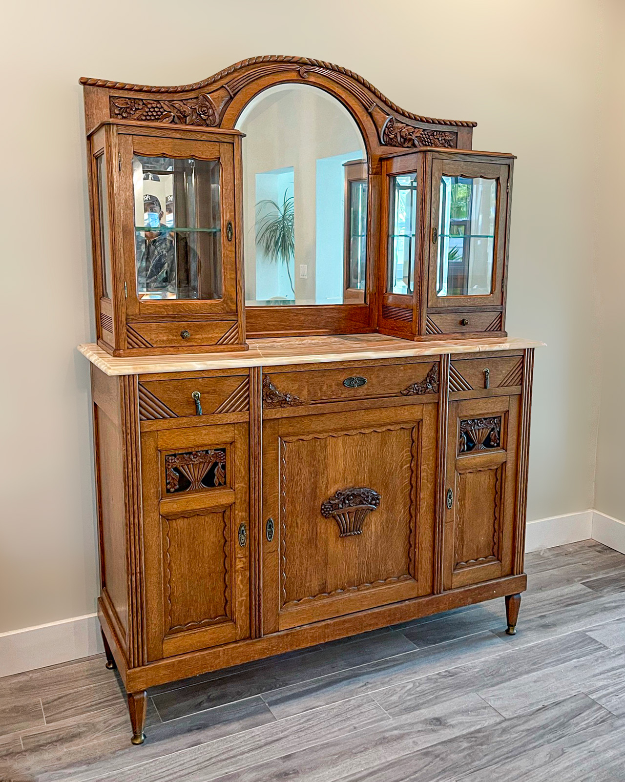 Appraisal: MARBLE TOP MIRROR BACK CHINA HUTCH Arched mirror flanked by